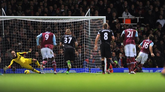 Nobes puts away his penalty.
