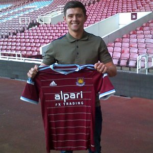 Nice shirt, and a smile. Must be good news !